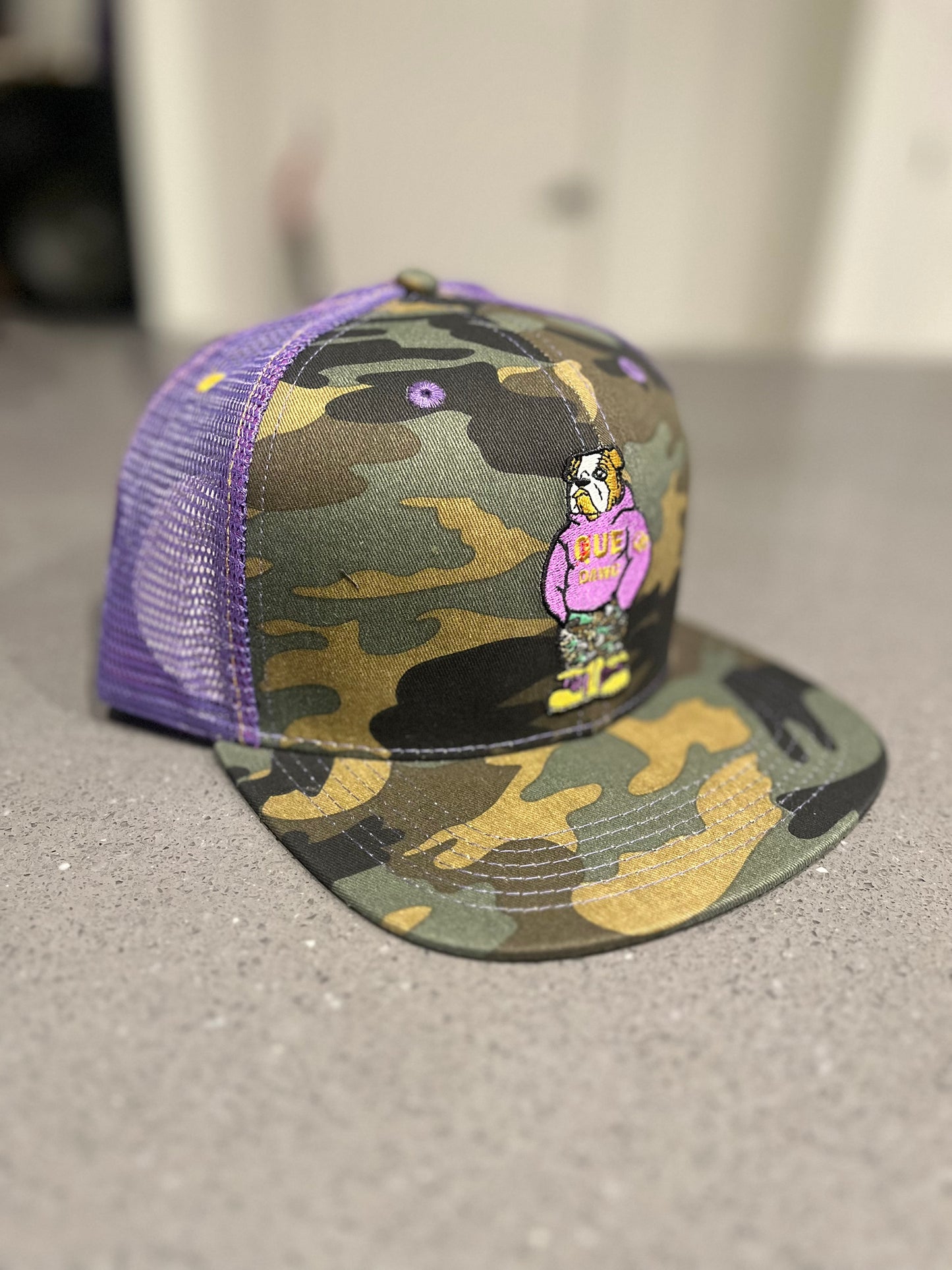 Que Dawg Camo Trucker