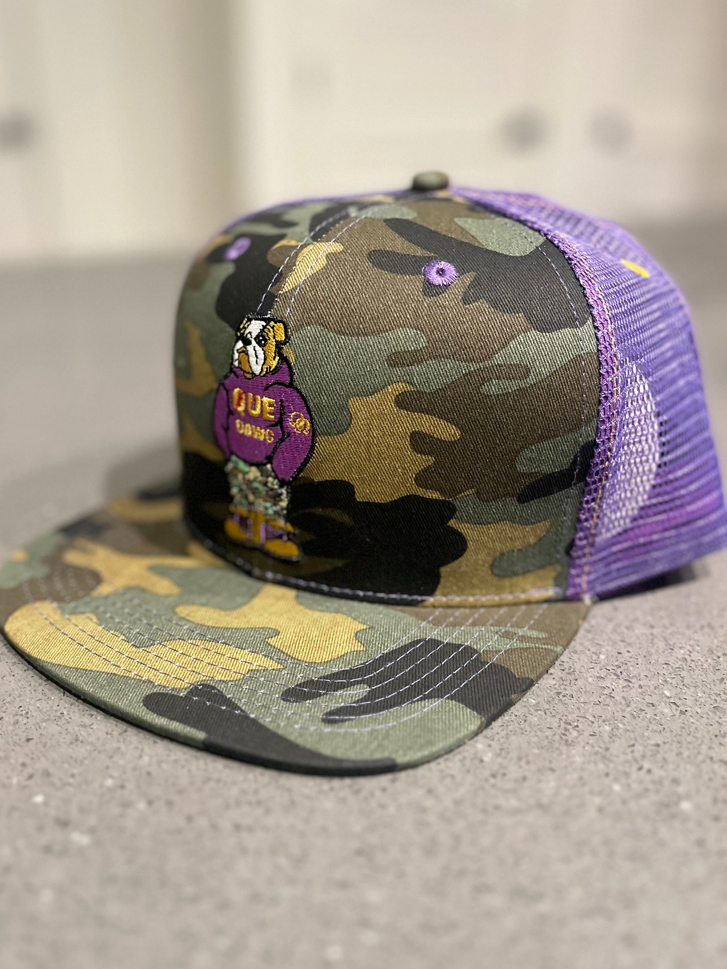 Que Dawg Camo Trucker