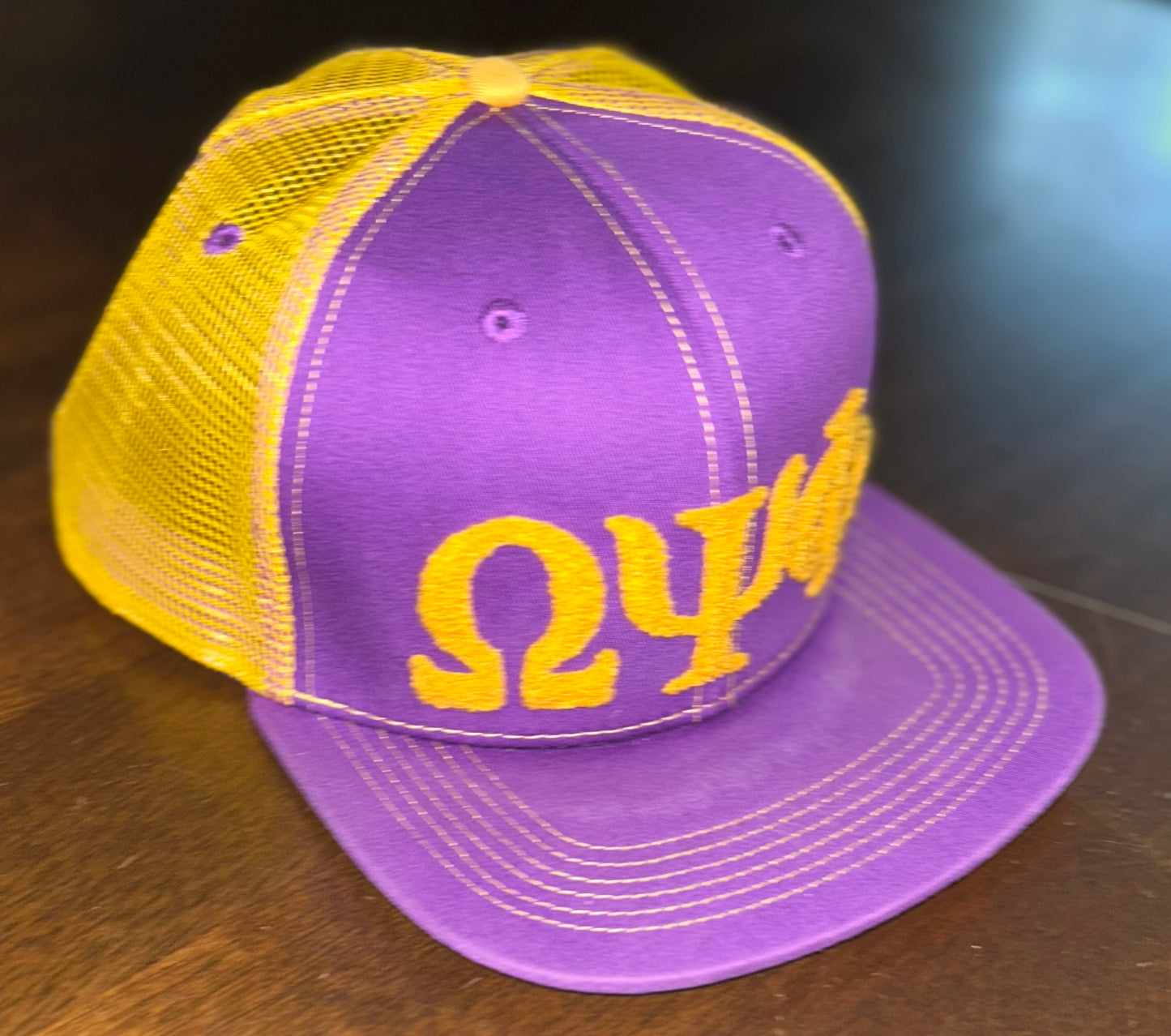 Omega Psi Phi Netback Trucker(Gold Back)