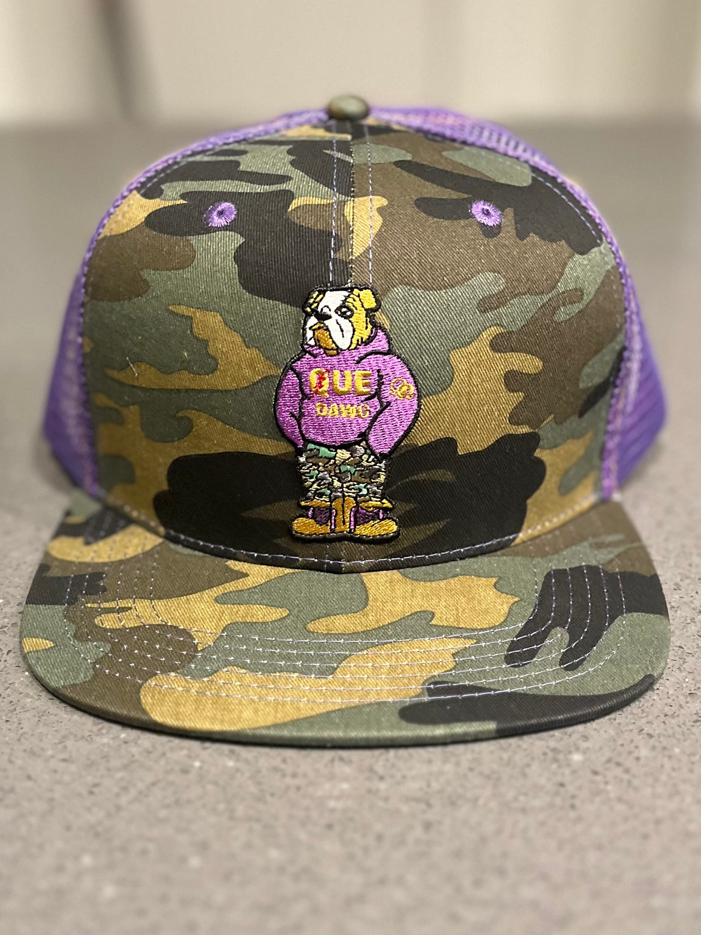Que Dawg Camo Trucker