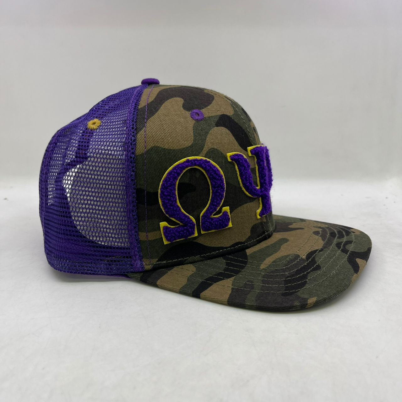 Omega Psi Phi Netback Trucker(Camo Front)